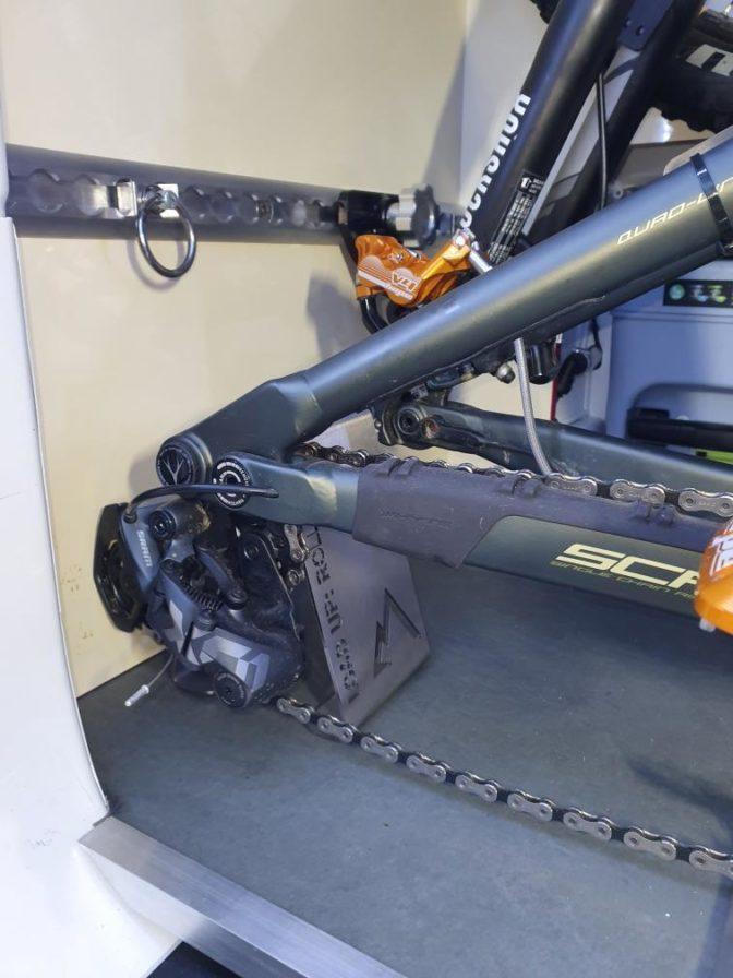 Loaded Bikes Fork Mounts and Universal Rear Axle Supports in small garage space of converted Mercedes LWB Sprinter