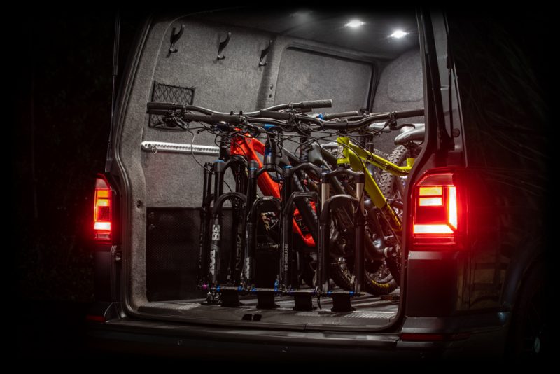 Loaded Bikes five mountain bikes in a van