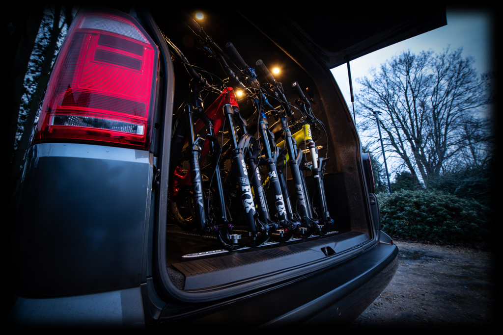 Loaded Bikes five mountain bikes in a van 03